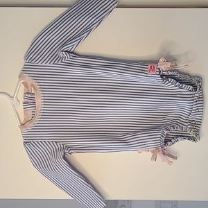 RuffleButts® Baby Girl UPF 50+ Sun Protection Long Sleeve Swimsuit.